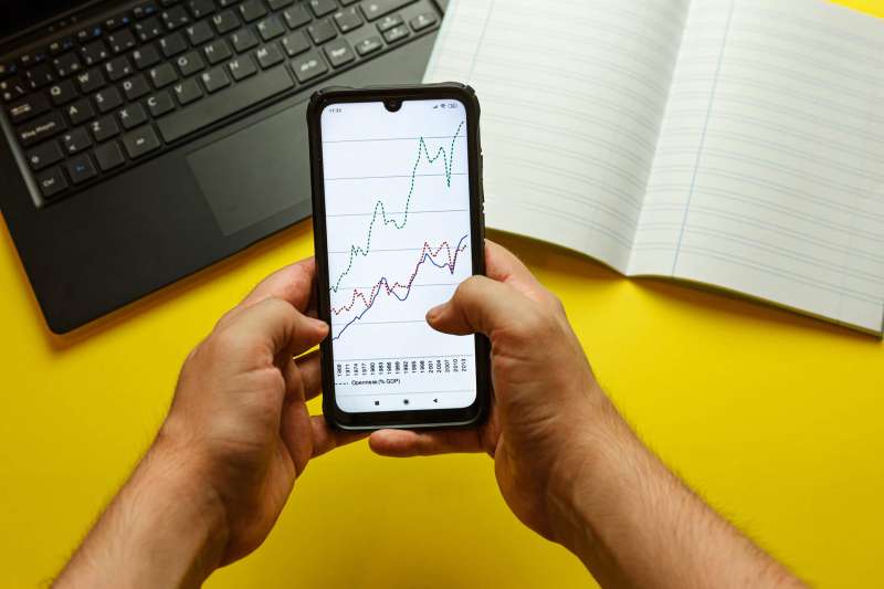 a phone with an analytical graph on the screen