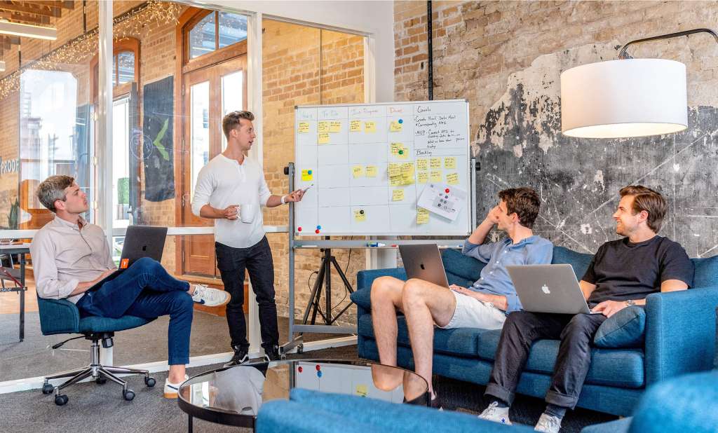 People meeting about UX design principles in a website