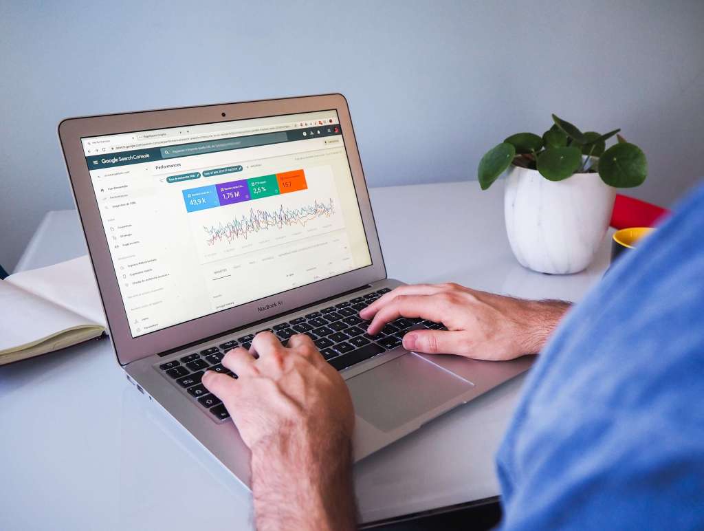 A person looking at Google Search Console on their laptop