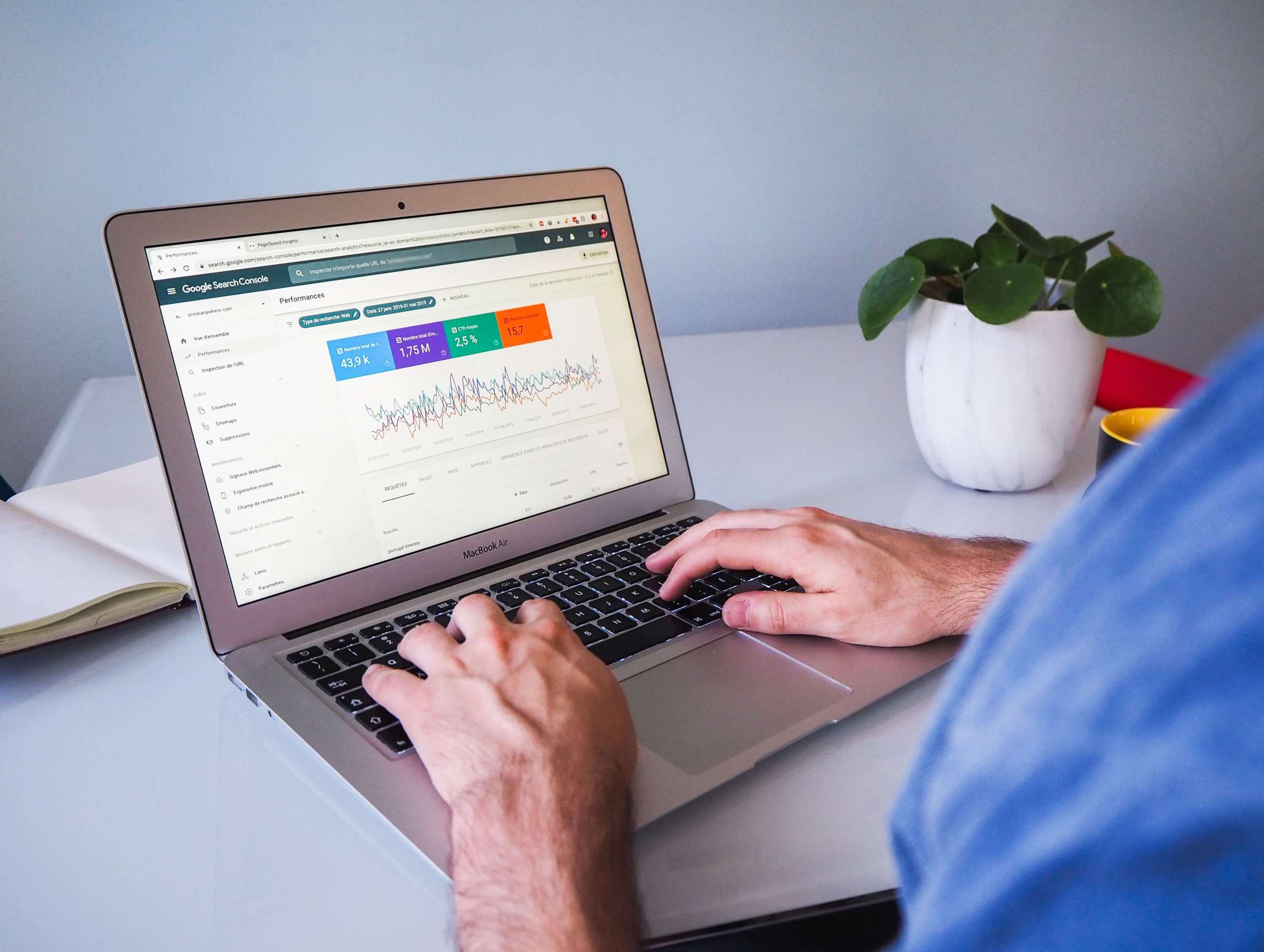 A person looking at Google Search Console on their laptop