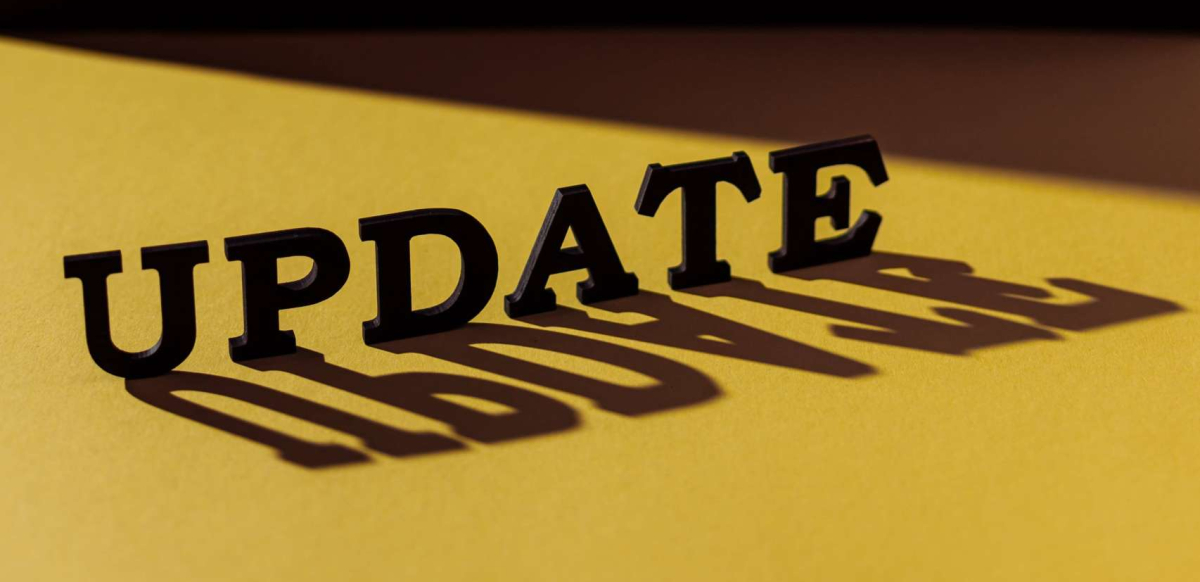 The word update sitting on a table